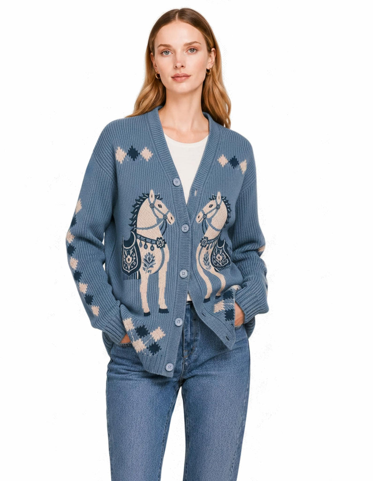 May include: A blue V-neck button-down cardigan featuring a knit pattern of two horses in beige and dark blue. The sleeves and shoulders are decorated with a diamond-shaped geometric motif in matching beige and dark blue tones.